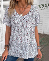 Volang blus med blommönster